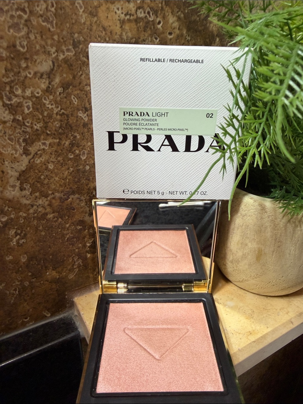 Prada Light Glowing Highlighter Powder 002 $90